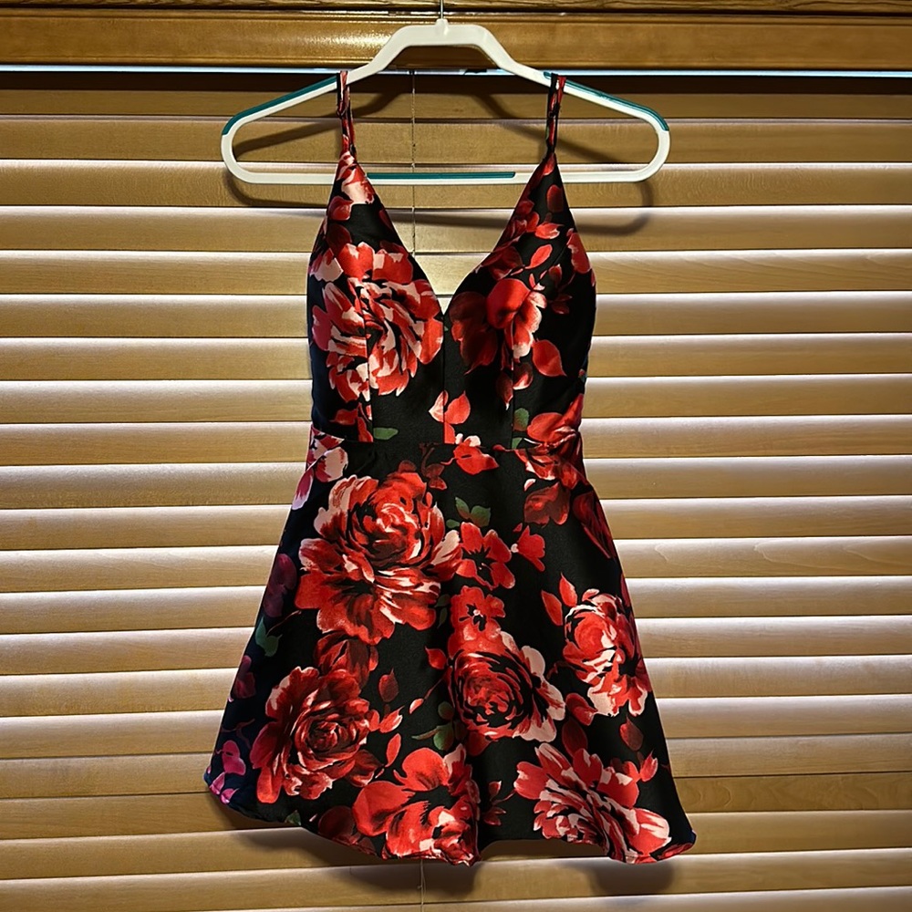 Homecoming dress: size 1, brand is B.Smart, black base with pink and red floral